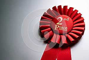 2nd place winners rosette or badge in red