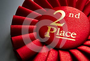 2nd place winners rosette or badge in red