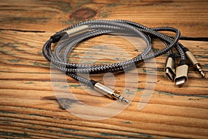 3 In 1 Type-C 3.5mm Jack Aux Cable on wooden background