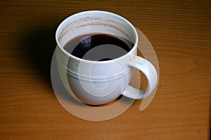 3/4 cup of black coffee that has been drunk and enjoyed