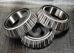 3 automotive tapered roller bearings on carbon fiber.