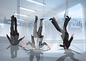 3 businessmen upside down stuck with transition background