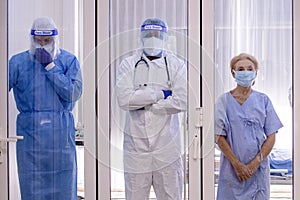 3 of Dortor, Nurse and patient looking out in the quarantine room - 19 Concept