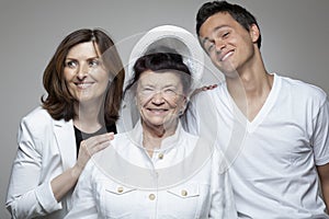 3 generations family in white cloths.