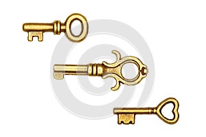 3 Golden keys isolated on white