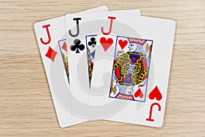 3 of a kind jacks - casino playing poker cards