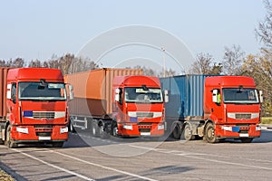 3 Semi trucks at warehouse loading dock of my port