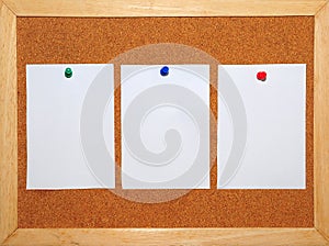 3 White Paper pinned on Corkboard