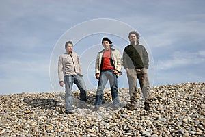 3 young men posing