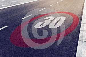 30 kmph or mph driving speed limit sign on highway