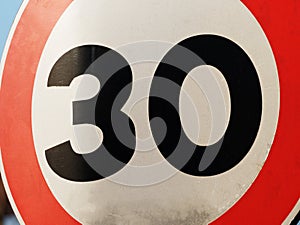 30 speed limit sign closeup