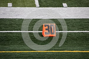 30 yard line marker at American football game