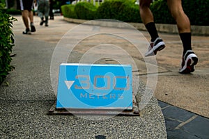 300 meters blue running sign