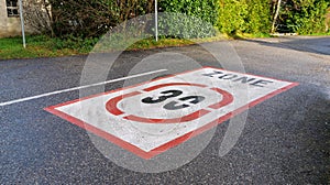 30km/h speed limit traffic road sign painted on the road