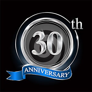 30th anniversary logo with silver ring and blue ribbon