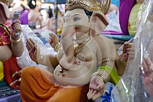 31 August 2023, Pune, India, Newly made idols of the God known as Ganesha or Ganapati for sale at a shop on the eve of Ganesh