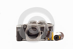 35 mm analog camera on a white background. Film camera