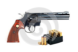 .357 revolver with ammo, isolated.