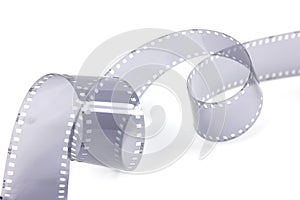 35mm film strip in white background, copy space cinema word with place for text,  film strip for festival, brochure, poster,