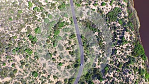 360 degree aerial view of car in sand hills