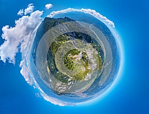 360 degree planet panorama aerial view over Piatra Craiului mountains peak in Transylvania, Romania