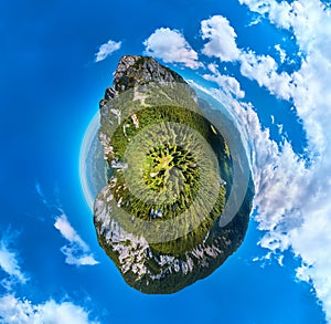 360 degree planet panorama aerial view over Piatra Craiului mountains peak in Transylvania, Romania