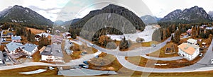 360 degrees aerial view of alpin town in summer season. Dolomite Mountains