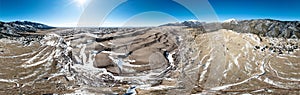 360 degrees sand dunes and snow top mountains