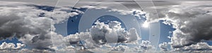 360 hdri panorama of blue overcast skydome with flock of birds in cumulus clouds, seamless sky panorama view with zenith for use