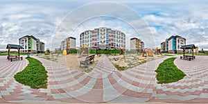 360 hdri panorama near playground in middle of modern multi-storey multi-apartment residential complex of urban development in