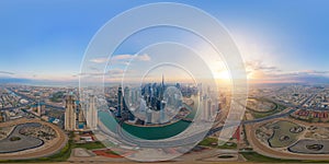 360 panorama by 180 degrees angle seamless panorama of aerial view of Dubai Downtown skyline and highway, United Arab Emirates or