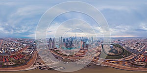 360 panorama by 180 degrees angle seamless panorama of aerial view of Dubai Downtown skyline and highway, United Arab Emirates or