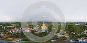 360 panorama by 180 degrees angle seamless panorama of aerial view of the Giant Golden Buddha in Wat Muang in Ang Thong district