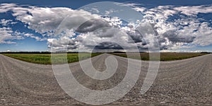 360 seamless hdri panorama view on gravel road before storm with overcast sky and dark cloud with rain in equirectangular
