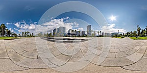 360 seamless hdri panorama view on square near seashore or ocean with skyscrapers with blue sky and good weather in