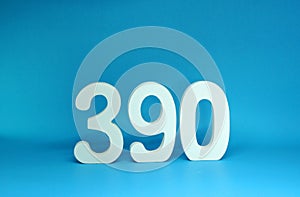 390  three hundred and ninety  word Isolated Blue Background with Copy Space - Number 390% Percentage or Promotion - Discount or