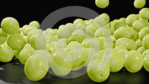 3d animation green grapes tumbling towards the viewer