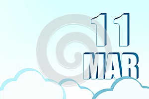 3d calendar with the date of 11 March on blue sky with clouds, copy space. 3D text. Illustration. Minimalism.