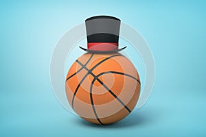 3d close-up rendering of basketball with little black tophat on top on light-blue background.