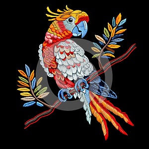 3d Embroidery textured colorful tropical exotic parrot bird on the branch. Vector embroidered beautiful surface bird pattern with