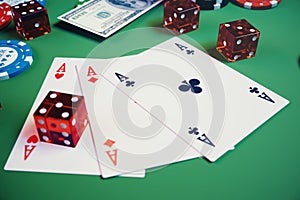 3D illustration casino game. Chips, playing cards for poker. Poker chips, red dice and money on green table. Online