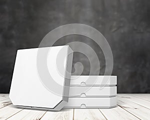 3D Illustration. Pizza boxes isolated on the wood background