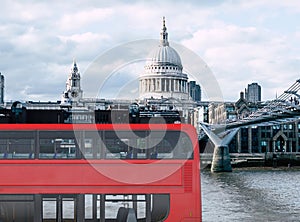 3D illustration of a red london bus and cityscape