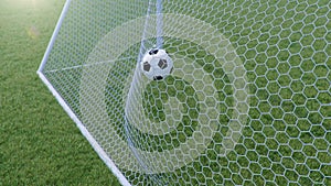 3D illustration Soccer ball flew into the goal. Soccer ball bends the net, against the background of grass. Soccer ball