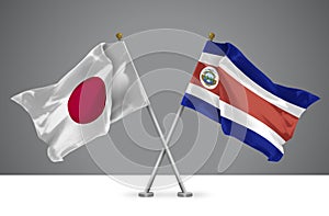 3D illustration of Two Crossed Flags of Japan and Costa Rica