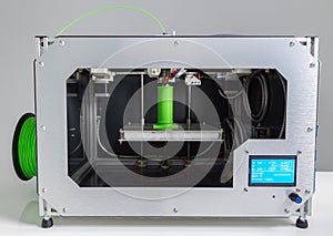 3d printer with bright green filament