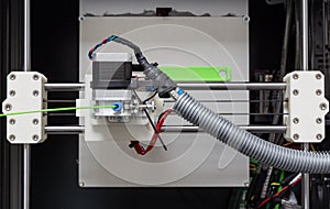 3d printer with bright green filament