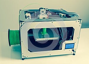 3d printer with bright green filament