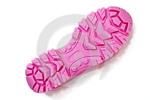 3D printer printed pink shoe soles in natural size isolated on white background