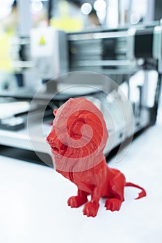 3D printer printing lion figure close-up